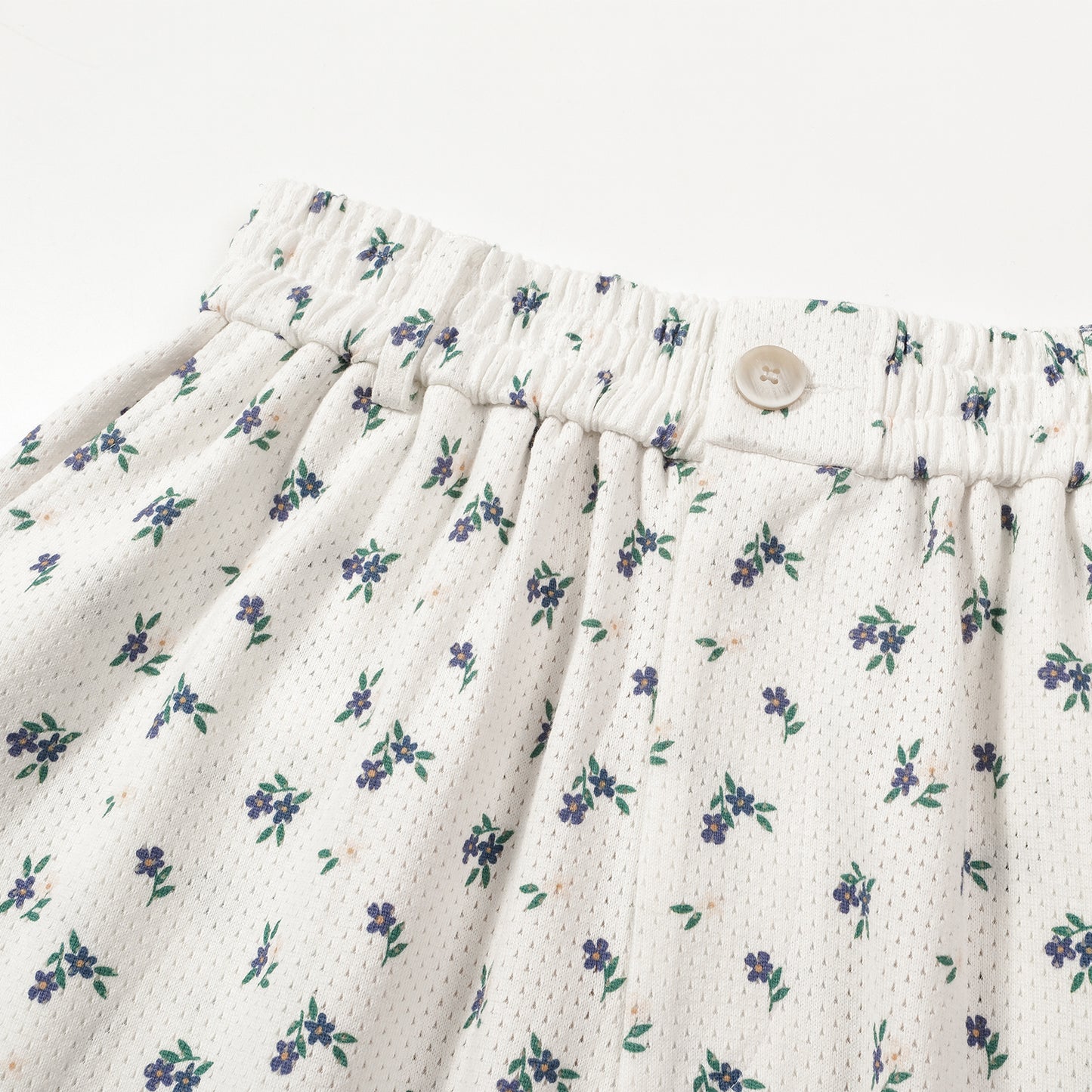 COTTON FLORAL MESH SHORTS